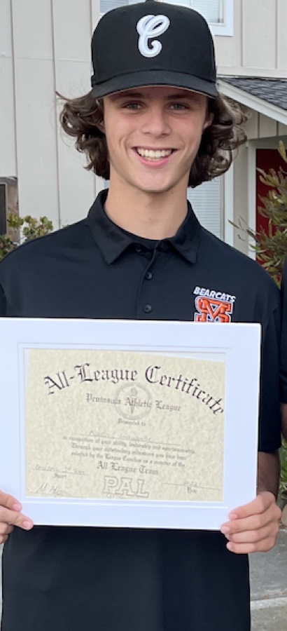 Austin Lachapelle holding an All-League certificate